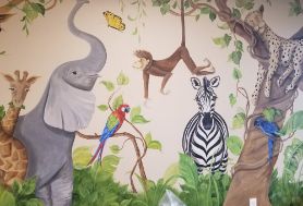 Wall art of several jungle animals