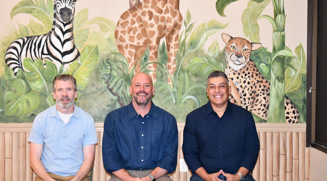 Bakersfield children's dentists Doctors Joseph Curtin, Daniel Purdy, and David Martinez smiling