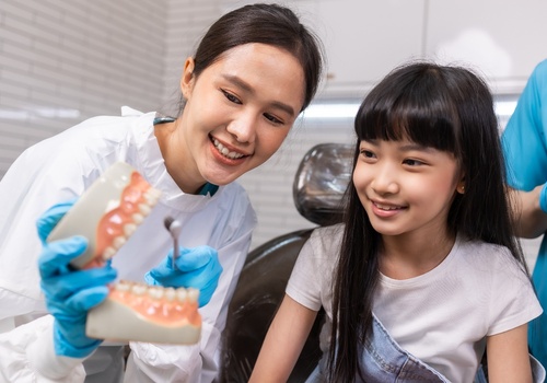 Child smiling at the dentist